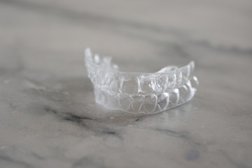 Invisalign orthodontics aligners, Invisible braces aligner. Mobile orthodontic appliance for dental correction