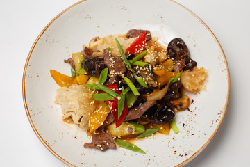 warm beef salad with a vegetables and fruits