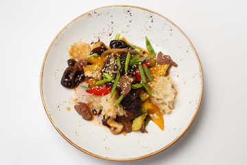 warm beef salad with a vegetables and fruits
