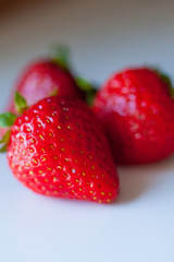 Strawberries on white marble counter top