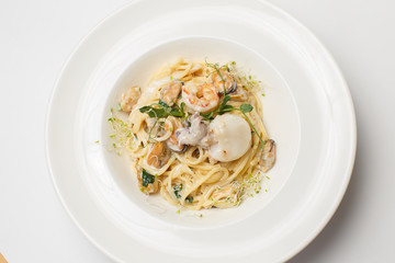 sea food pasta on white background