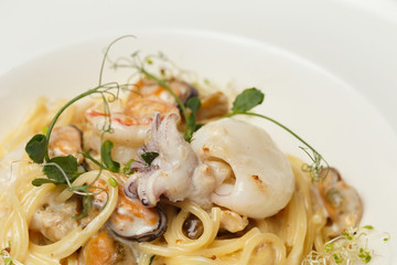 sea food pasta on white background