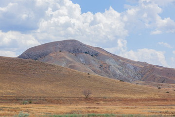 Low mountains against the clouds