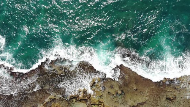 clear turquoise water in achziv beach