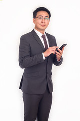 Happy business man look camera using smartphone connect to technology network standing on white background
