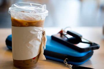 Iced coffee with tissues sleeve and lid, you can drink coffee pass lid replace straw