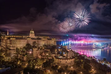 Plexiglas foto achterwand Budapest, Hungary - Aerial panoramic view of the 20th August 2019 State Foundation Day fireworks with illuminated Buda Castle Royal Palace and Szechenyi Chain Bridge by night © zgphotography