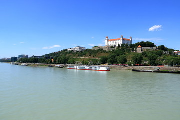 Fototapeta na wymiar View to Bratislava castle against blue sky
