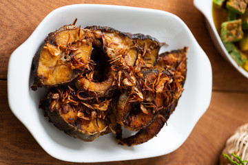 Deep Fried Fish Recipe in white plate on  table
