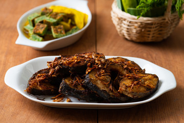 Deep Fried Fish Recipe in white plate on  table