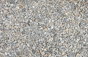 round stone pebbles texture, little stone material background pattern. 