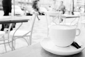 cup of coffee for breakfast in a cafe / serving cup of coffee in modern interior, a European breakfast