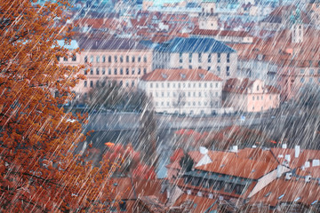 autumn landscape in the czech republic / rain in Prague, red roofs, panoramic view of Prague in rainy autumn, weather cold