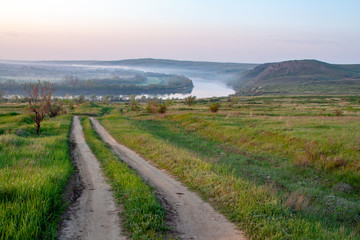 Fototapeta na wymiar morning reeds mist fog and surface on the river