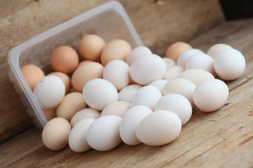Fresh farm chicken eggs on the counter.