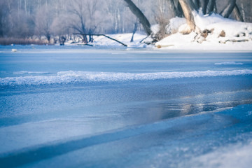 Ice on a frozen river on a frosty winter day