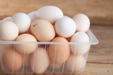 Fresh farm chicken eggs on the counter.