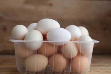 Fresh farm chicken eggs on the counter.
