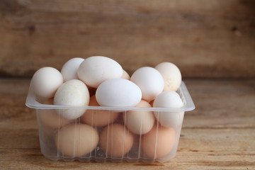 Fresh farm chicken eggs on the counter.