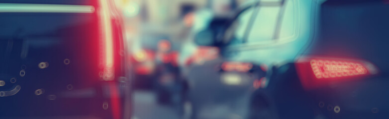 view of car in  traffic jam / rear view of the landscape from window in car, road with cars, lights...