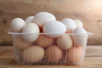 Fresh farm chicken eggs on the counter.
