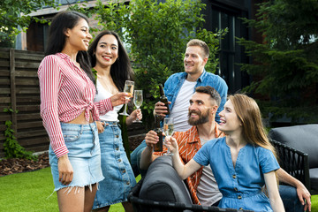 Front view young people toasting drinks