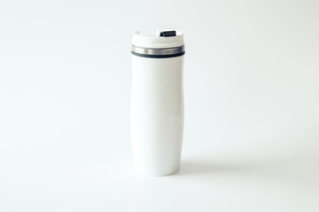 Mockup. Metal travel mug with a place for your design on white background. White mug. Isolated.