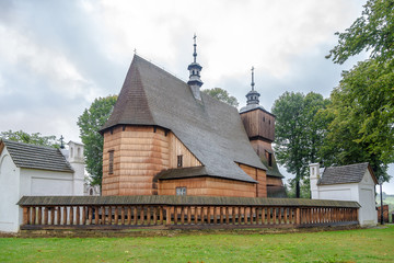 Fototapeta na wymiar View at the Wooden Church of All Saints in Blizne village - Poland