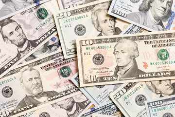 heap of US Dollar bills, money background. Top view of business concept on background with copy space