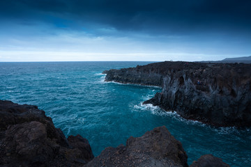 Beautiful rigid volcanic beaches in El Golfo on Lanzarote island, Canary Islands, Spain. 