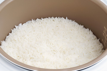 Jasmine rice cooking in electric rice cooker.       