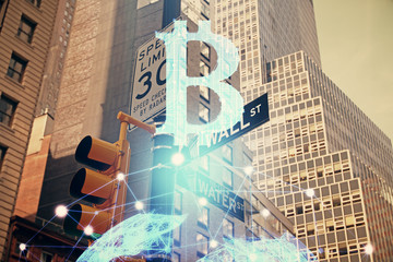 Double exposure of crypto currency theme hologram drawing and city veiw background. Concept of...