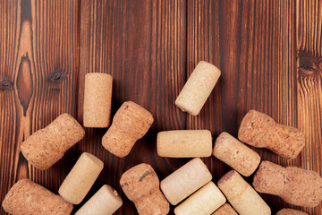 wine corks on a dark wooden background texture with a place for text.  - Image