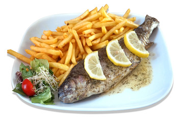 Baked fish - trout, salad and french fries on plate