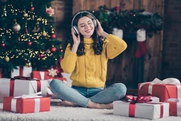 Full length body size photo of rejoicing nice overjoyed girl listening to christmas music rejoicing...