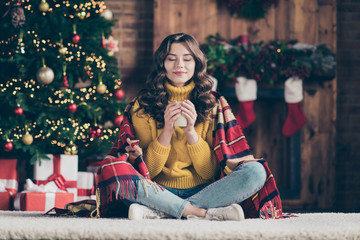 Full length body size photo of cheerful beautiful funny funky attractive nice cute girl smelling her drink wearing jeans denim yellow pullover enjoying coffee while sitting on floor