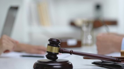 Professional lawyer and attorney shaking hands in court room, case agreement