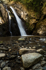 Fototapeta na wymiar Waterfall and rocks