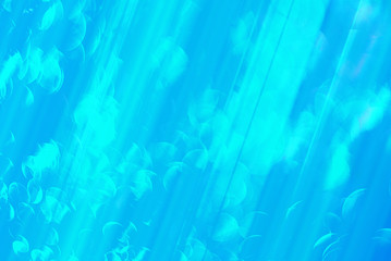 Fototapeta na wymiar Turquoise background of pearly glare