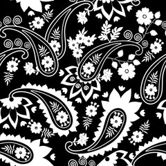 Black and white seamless ethnic pattern with paisley and abstract flowers.