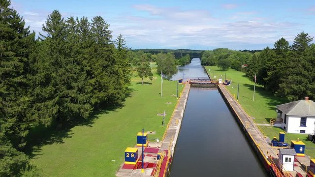 Aerial Erie Canal lock 29 Palmyra New York. Pioneer engineering wonder. 363 miles long man made waterway built in 1817. Transport of cargo from eastern ports and cities.