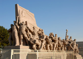 Revolutionary monument in front of the Mausoleum of Mao Zedong (Chairman Mao) in Tiananmen Square,...