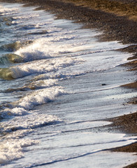 waves washing up on shore