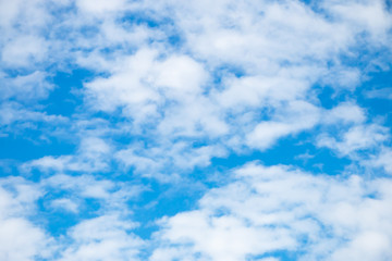 Beautiful blue sky and clouds background with copy space.