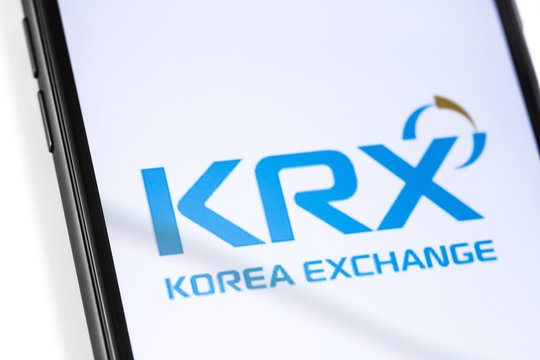 closeup smartphone with KRX logo on the screen. KRX, Korea Exchange. Moscow, Russia - March 17, 2019