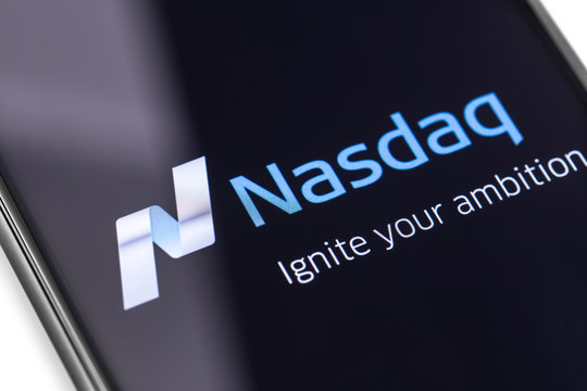 closeup smartphone with Nasdaq logo on the screen. Nasdaq is an American stock exchange. It is the second-largest exchange in the world. Nasdaq logo visible. Moscow, Russia - March 17, 2019