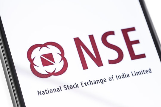 closeup smartphone with NSE logo on the screen. NSE, National Stock Exchange of India Limited. Moscow, Russia - March 17, 2019