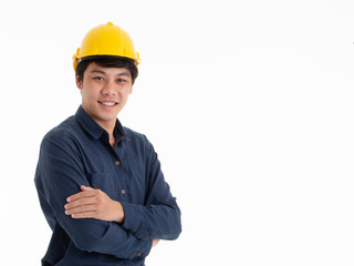 Young Asian engineer with yellow helmet hat isolated on white background with copy space. Construction and home design concept.