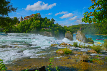 Naklejka na ściany i meble At the Rhine Falls in Switzerland. - There are much bigger waterfalls, but this 