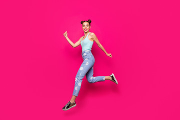 Fototapeta na wymiar Full size profile side photo of charming lady with pink lipstick running smiling isolated over fuchsia background